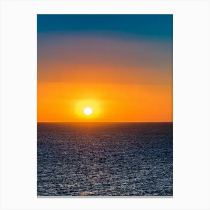 Sunset Over The Ocean Canvas Print by imagine