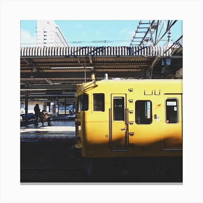 Yellow Train In Japan Square Canvas Print by Jessica Glazov